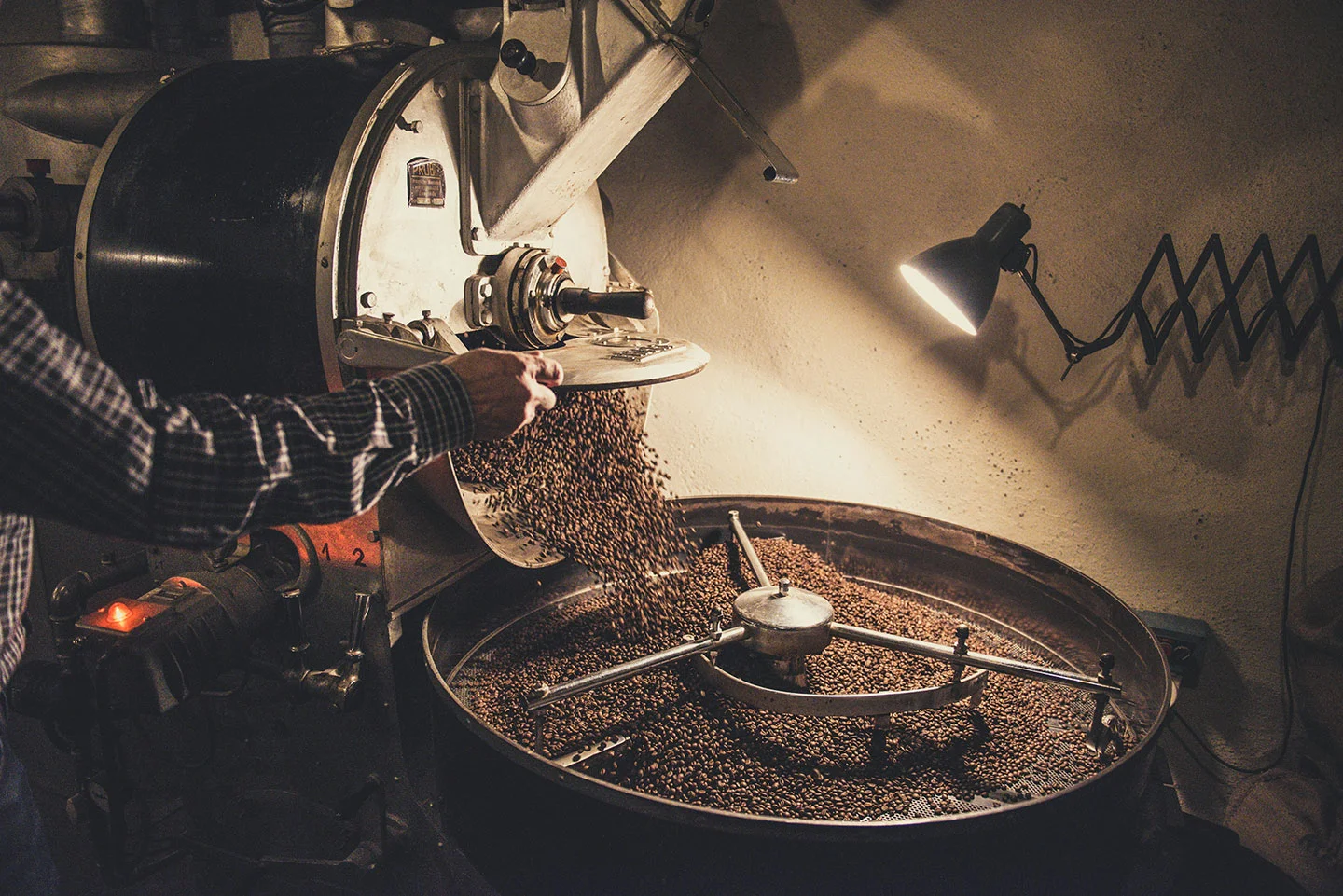 Coffee roaster roasting coffee beans at windsor cycle brew