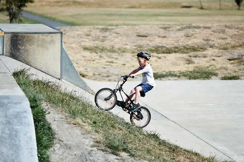 autistic child on a bike